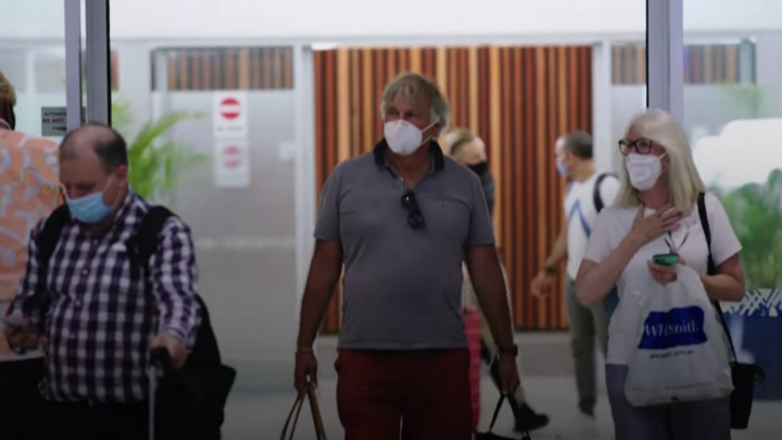 Grass-skirted traditional dancers welcomed elated holidaymakers back to Fiji, as the South Pacific nation opened its borders to international travellers for the first time since the pandemic began.